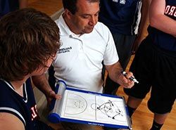 Collaborate with professional Spanish trainers on basketball camp in Barcelonas