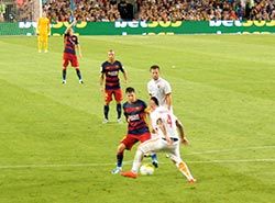 Lionel Messi dribbling against Rome in Joan Gamper tournament